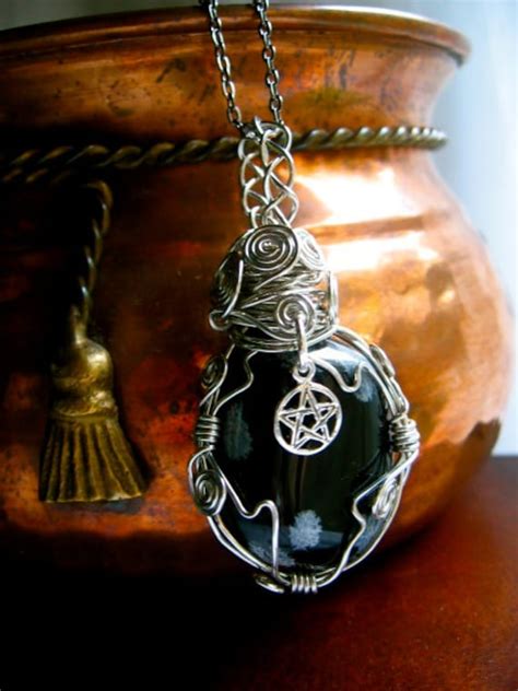 The Obsidian Amulet of Darkness and Its Connection to the Underworld Deities